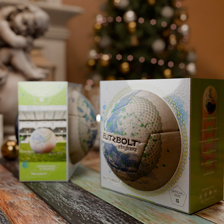 A packaged BlitzBolt Soccer ball on a table with a Christmas tree in the background.